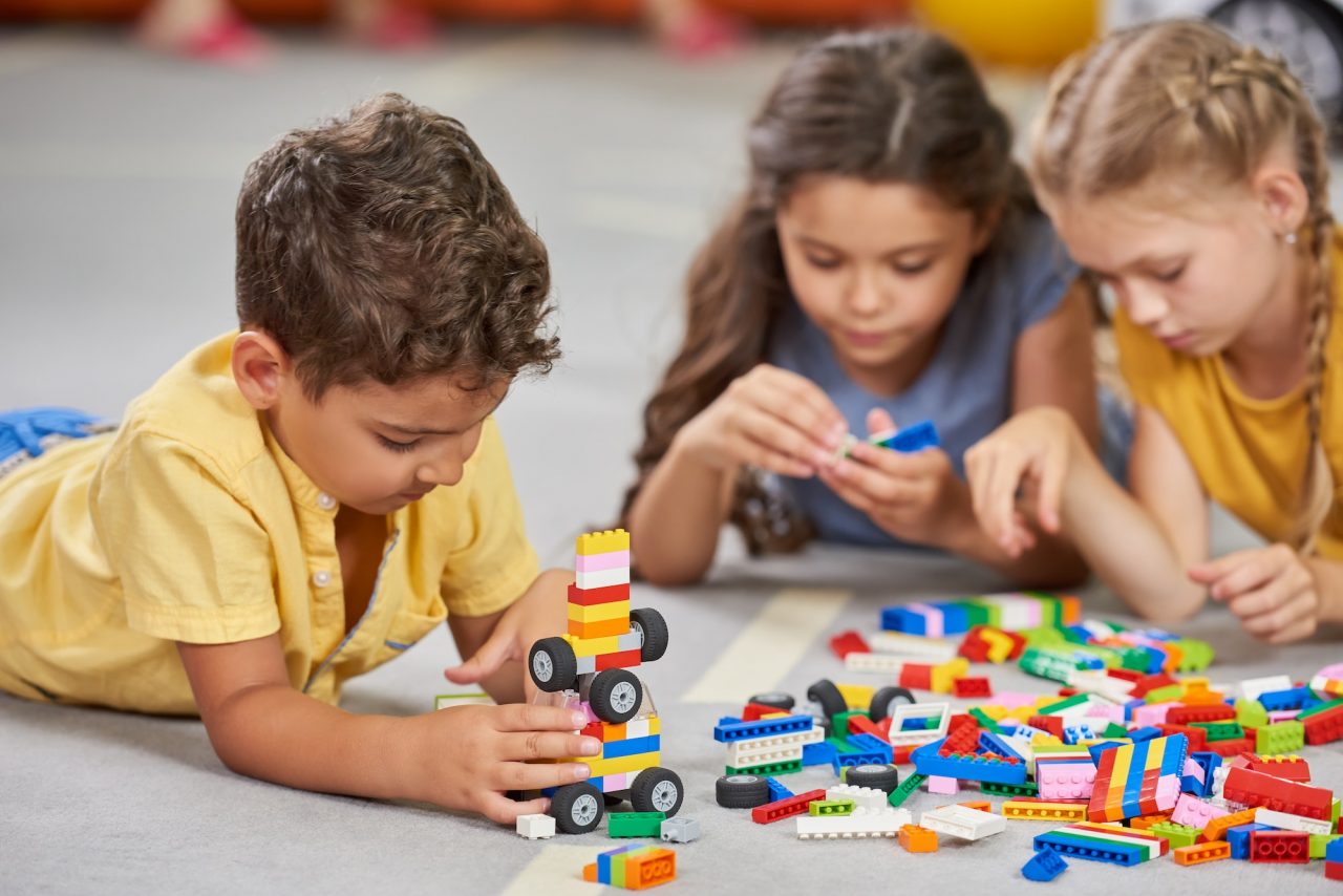 Children Playing Together In The Classroom In Kindergarten .jpg